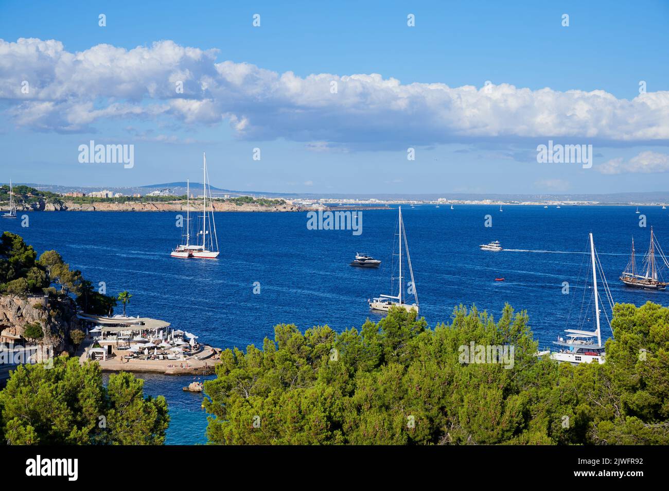 yachts moored in front of Illetas in Majorca on a hot summer day Stock Photo