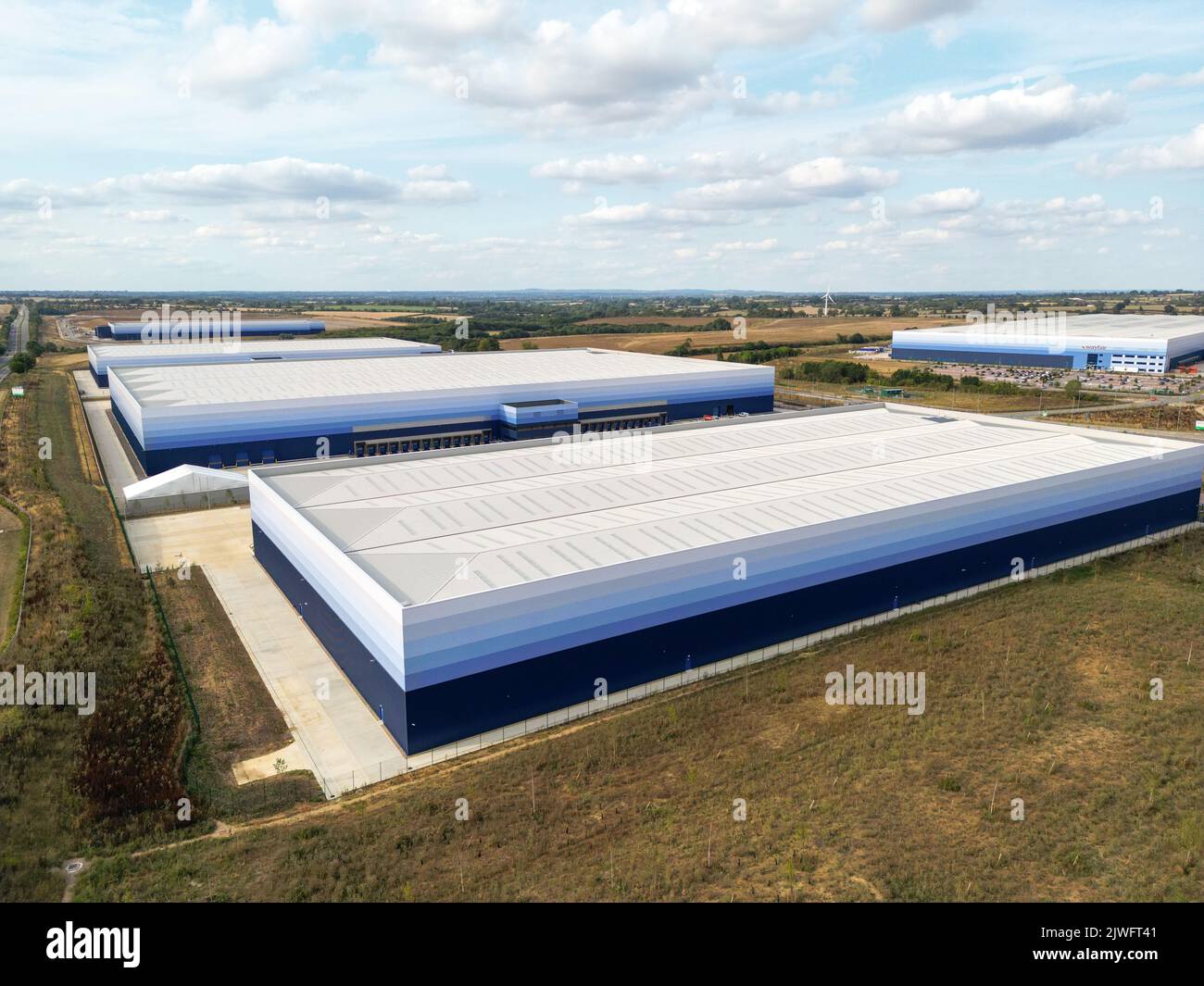 An aerial view of new developments in Magna Park North. The business units are colour graded to blend in with the sky. The picture was taken from a public road and not on Magna Park Property. Stock Photo