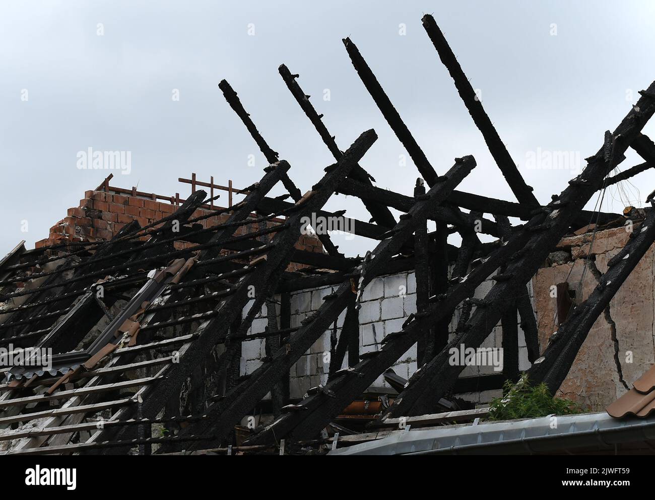 burned rooftop of a house Stock Photo