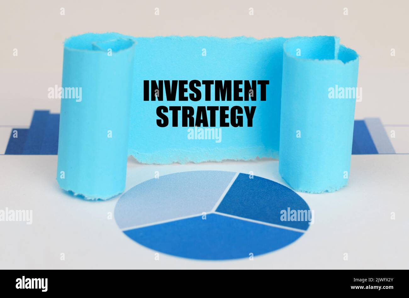 Business concept. On the blue diagram and graphs there is a twisted