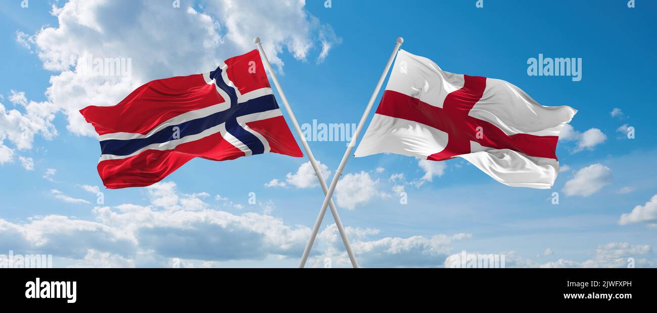 two-crossed-flags-england-and-norway-waving-in-wind-at-cloudy-sky