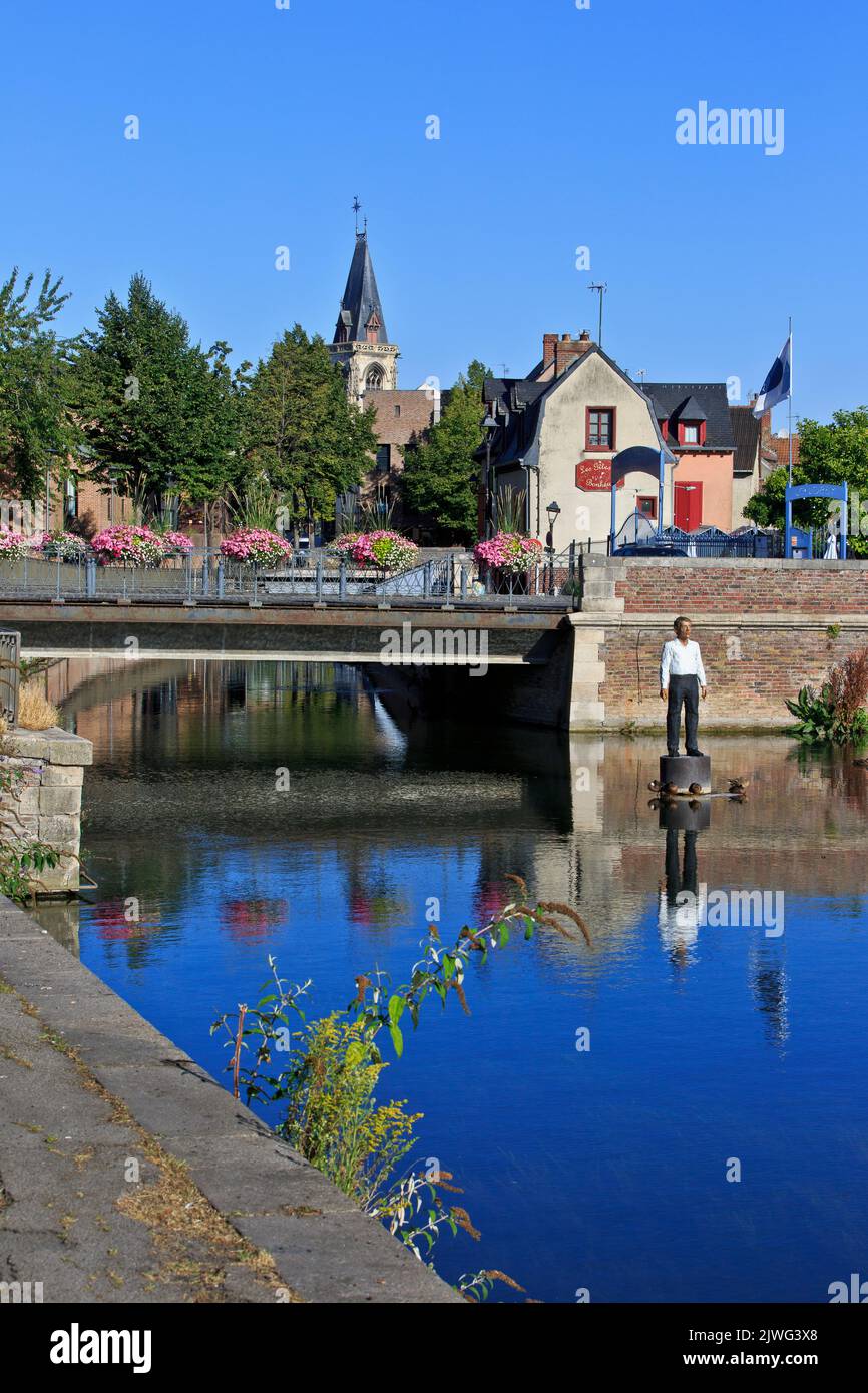 The man on his buoy (L'Homme sur sa bouée) by German artist Stephan Balkenhol in the middle of the Somme river in Amiens (Somme), France Stock Photo