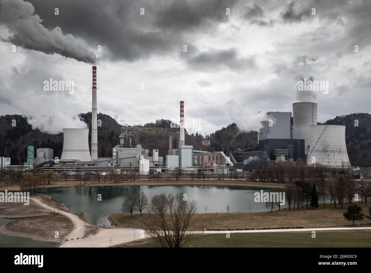 Co2rich emission and water vapor rising from a thermal power plant