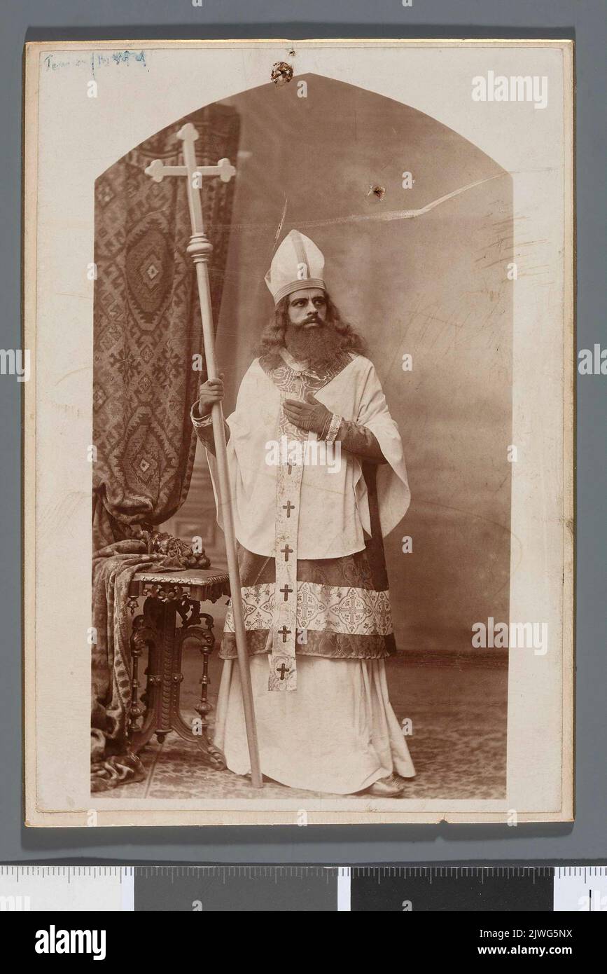 Portrait of Michał Tarasiewicz (1871-1923), actor, in stage costume (entire figure in costume of a clergyman). unknown, photographer Stock Photo
