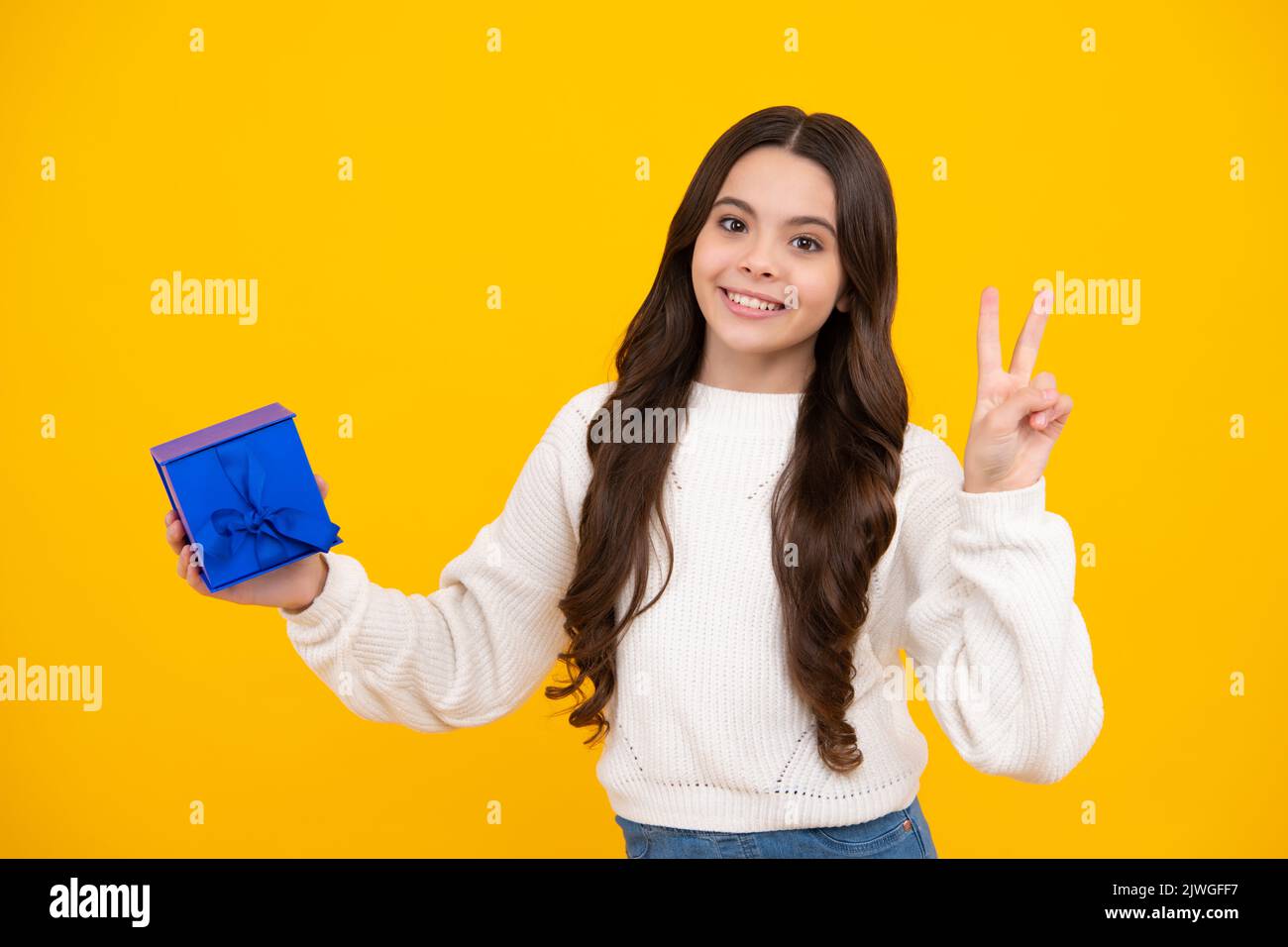 Cute teenager child girl congratulate with valentines day, giving romantic  gift box. Present, greeting and gifting concept. Surprised teenager girl  Stock Photo - Alamy