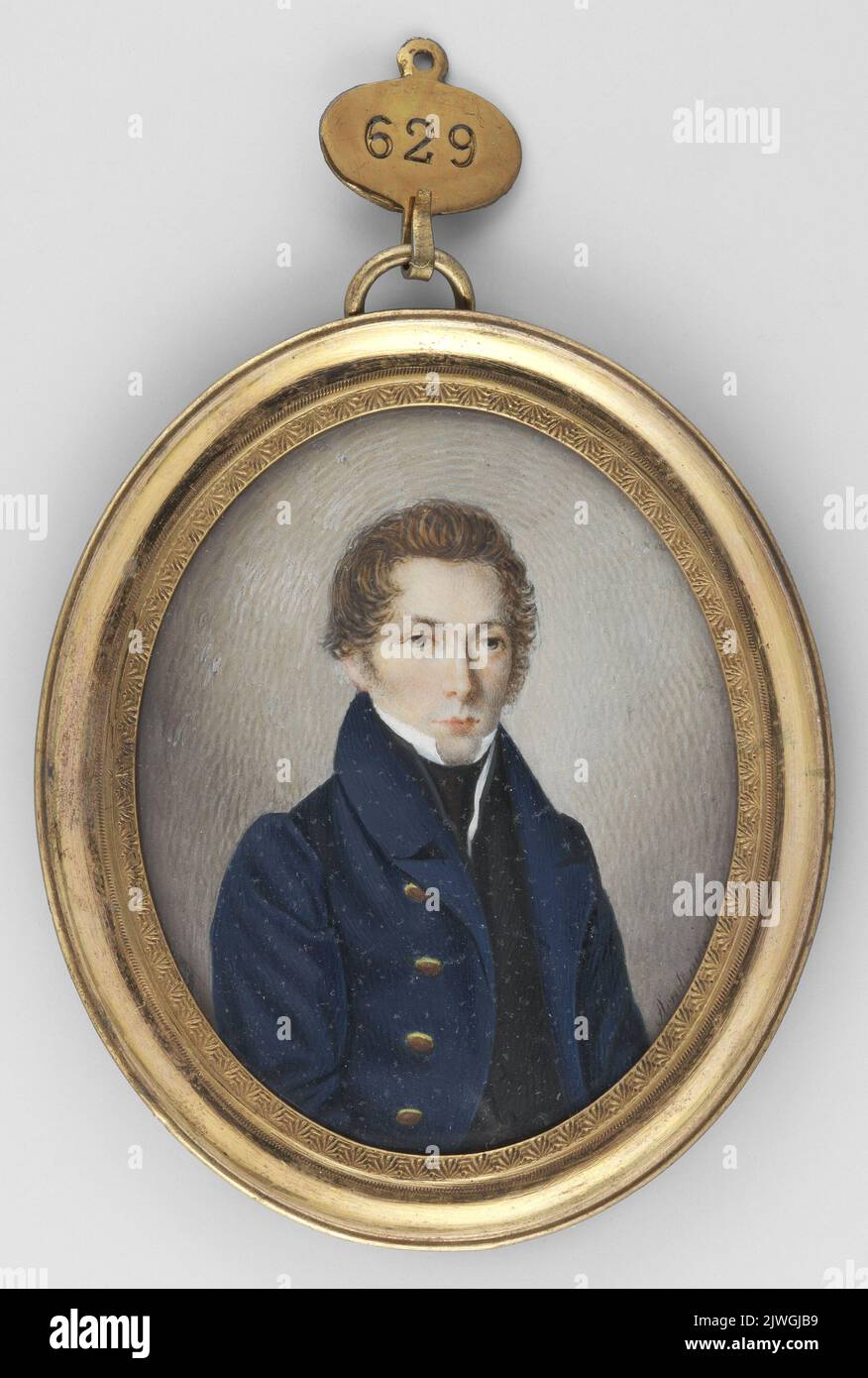 Portret mężczyzny w granatowym surducie ze złotymi guzikami. Anidt (fl. 1829-1850), painter Stock Photo