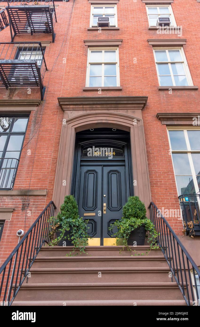 New York Townhouse with front door and steps Stock Photo