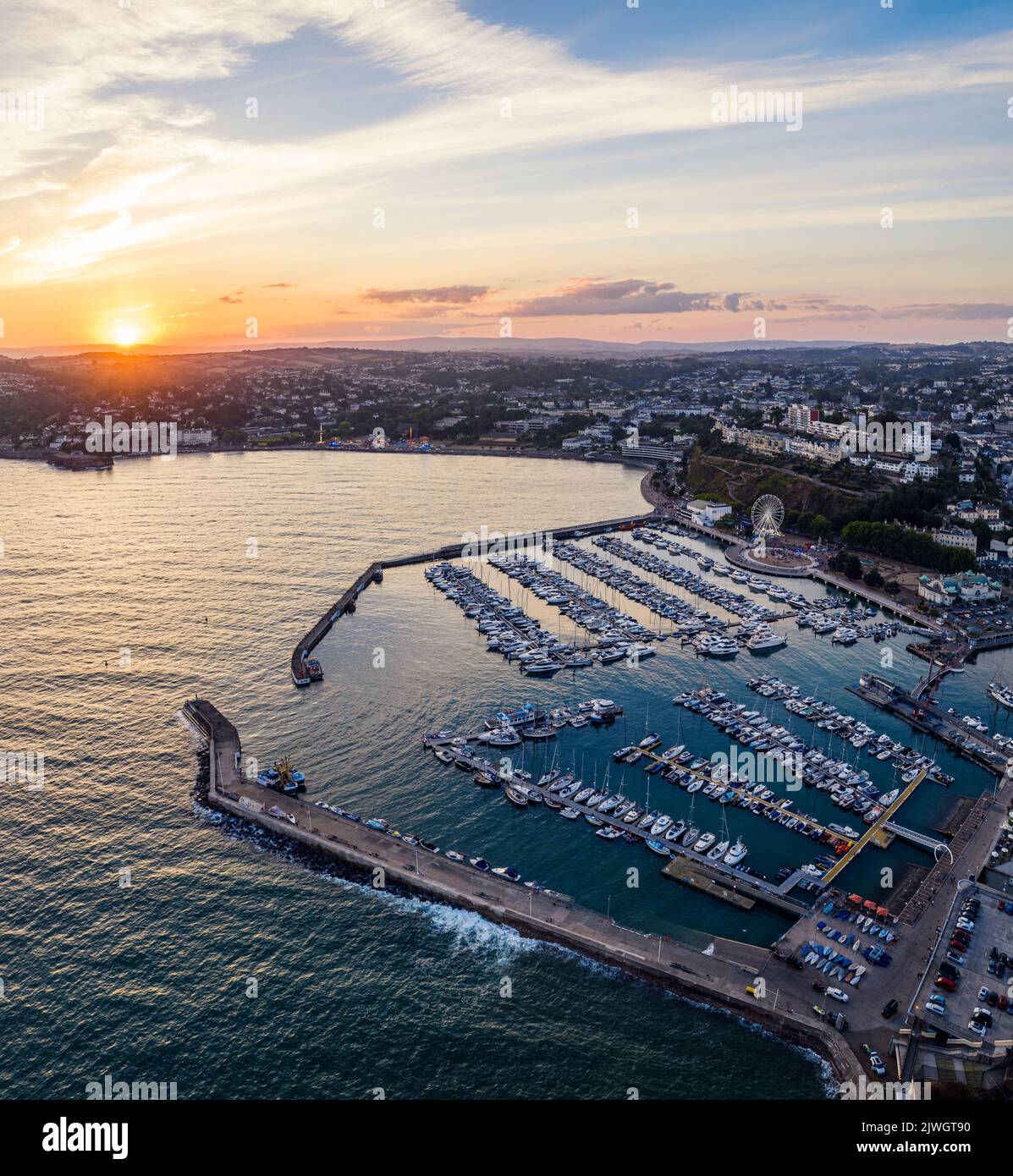 Sunset over Torquay Harbour and Marina, English Riviera from a drone, Devon, England, Europe Stock Photo