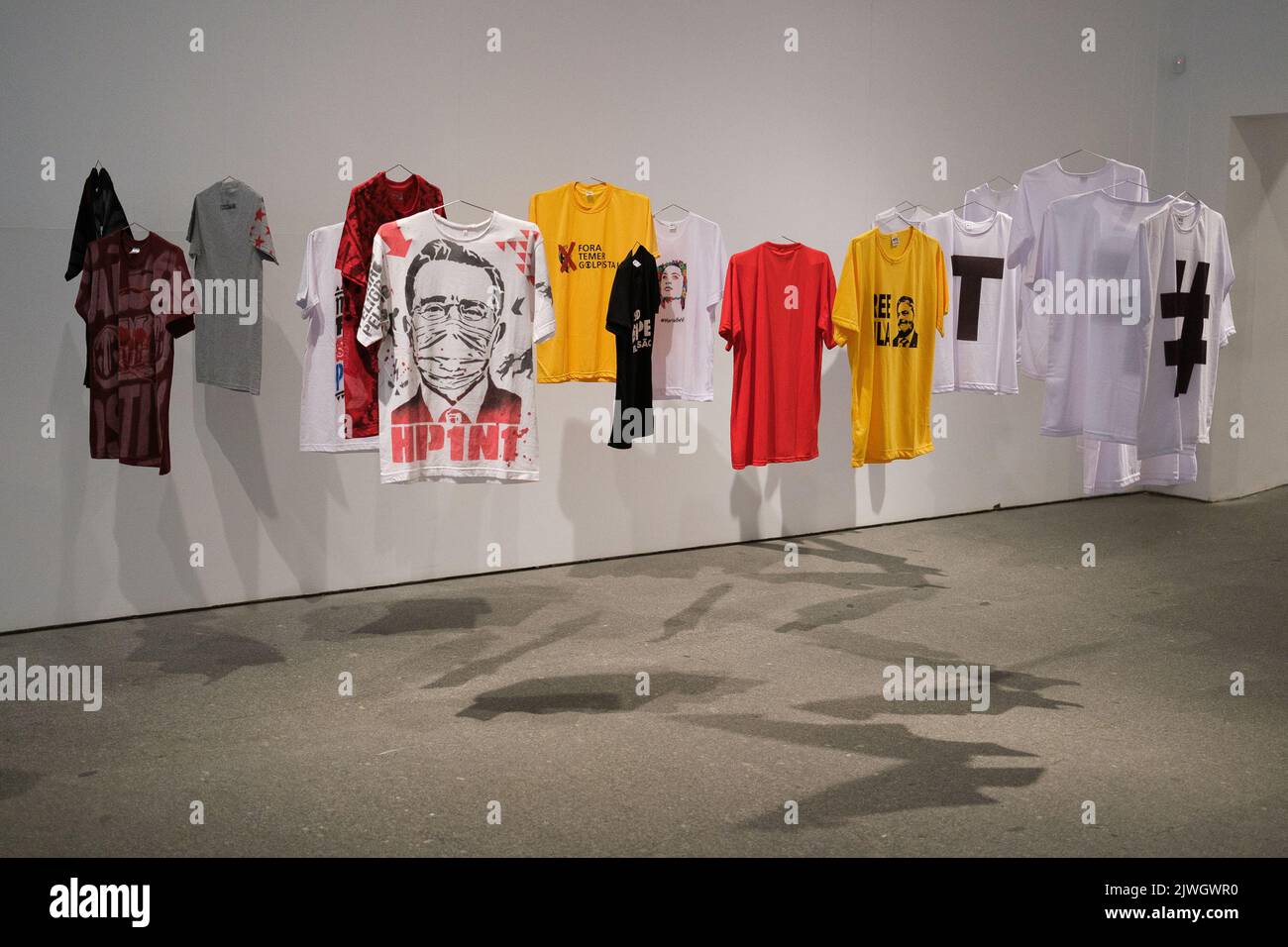 (Editor's Note: Editorial Use Only) An installation of 'T-shirts with designs' seen during the exhibition 'Giro grafico. Como en el muro la hiedra', at the Reina Sofia Museum. This exhibition was carried out by the Network of Conceptualisms of the South, makes a tour of graphic initiatives from the 1960s to the present on politically oppressive contexts of urgencies in Latin America. Graphic spin. As on the wall, the ivy is the result of a long process of collective research carried out by the Red de Conceptualismos del Sur in collaboration with the Reina Sofía Museum. The exhibition proposes Stock Photo
