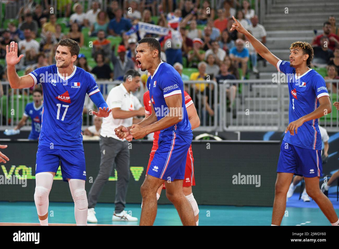 France celebrate the win against Japan. Volleyball World Championship