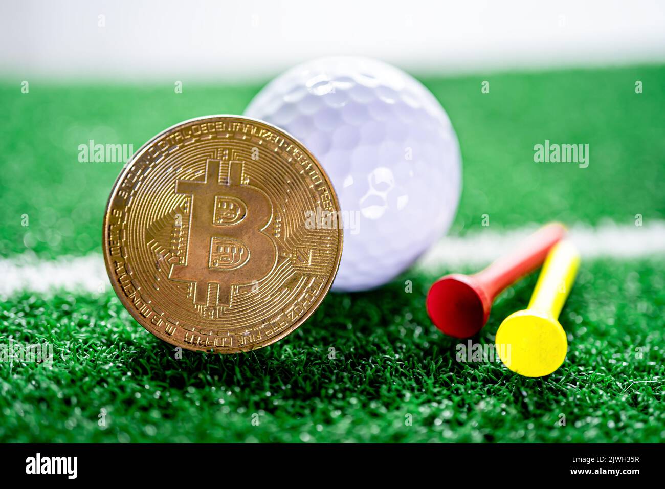 Gold bitcoin with soccer ball or football, cryptocurrency used in online sports  betting Stock Photo - Alamy
