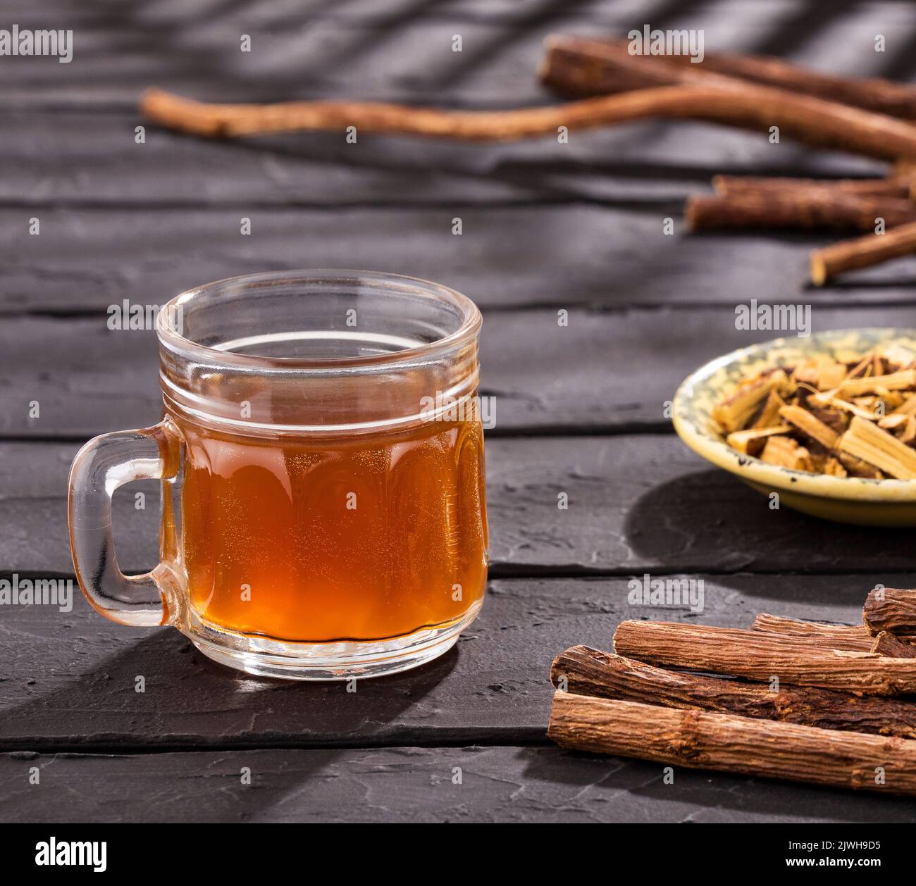Glycyrrhiza glabra Licorice roots with hot drink Stock Photo Alamy