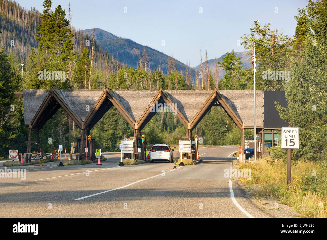 Early morning tourists at the East Entrance gates and pay stations of