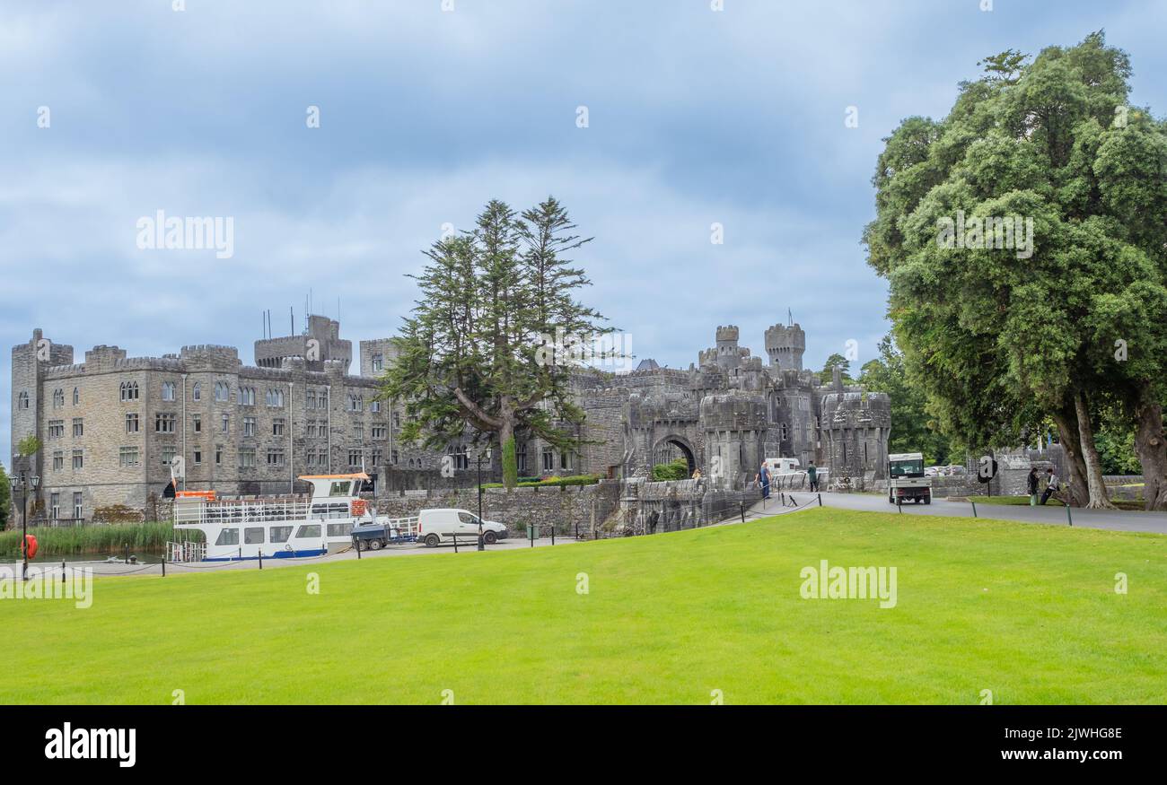 Ashford Castle is a medieval castle that has been expanded over the centuries and turned into a five-star luxury hotel near Cong in Ireland. Stock Photo