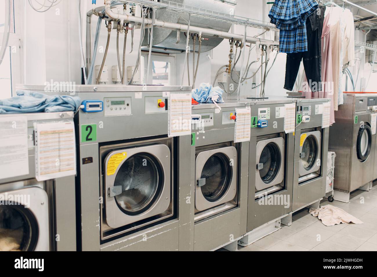 Dry cleaning clothes. Clean cloth chemical process. Laundry industrial