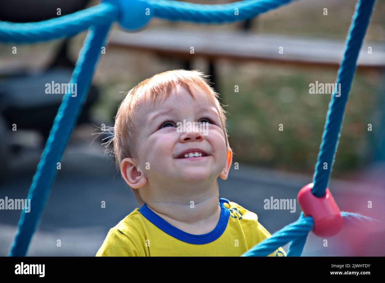 Portrait of sweet little boy on playground Stock Photo