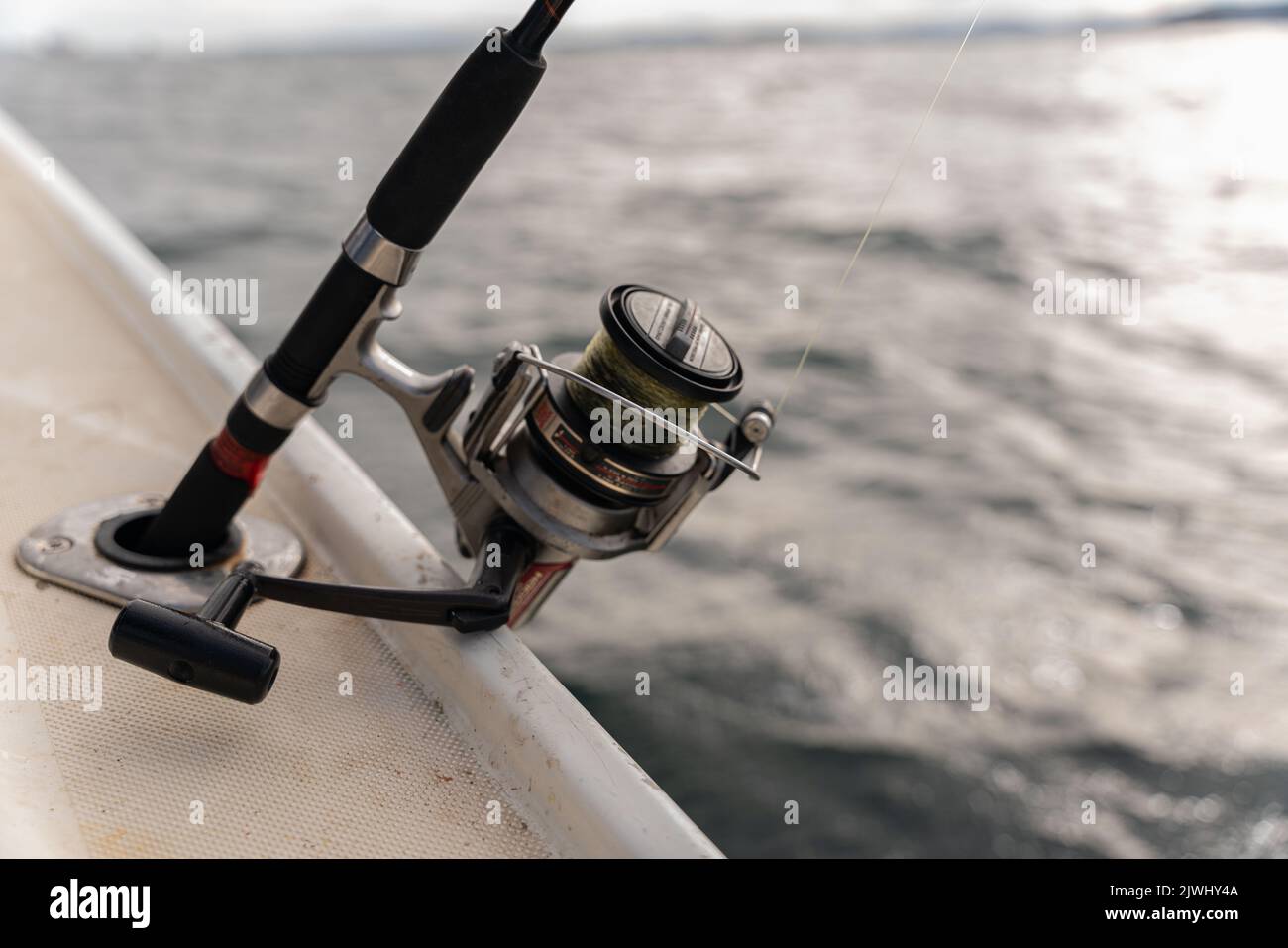 Hawaii, closeup of fishing rods & reels on a boat deep sea fishing C1376 -  SuperStock