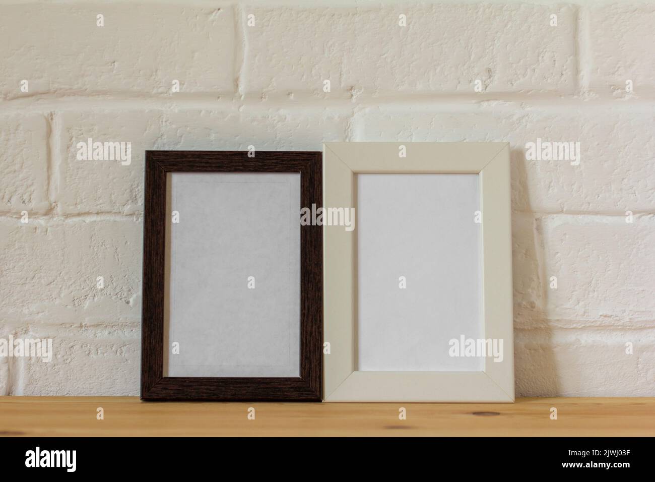 Empty photo frames on the table with copy space Stock Photo