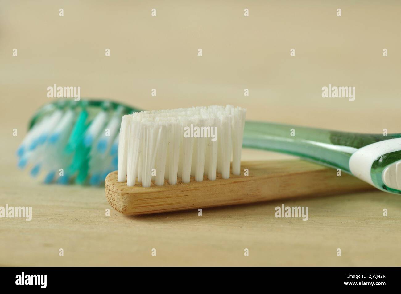Close-up of wooden and plastic toothbrush - Concept of ecology and plastic pollution problem Stock Photo