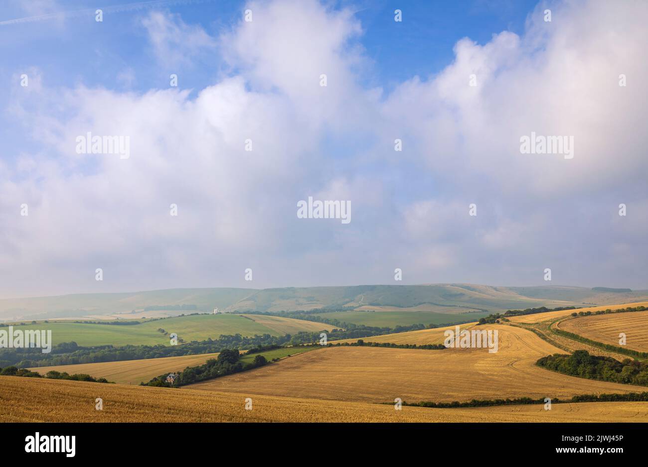 View of Kingston ridge from Lewes downs with September morning mist clearing east Sussex south east England Stock Photo
