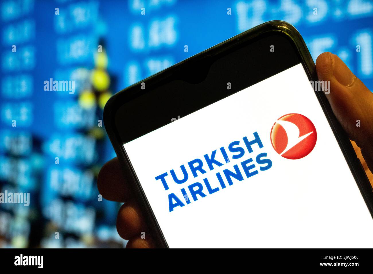 In this photo illustration, the Turkey national flag carrier airline Turkish Airlines logo is displayed on a smartphone screen. Stock Photo