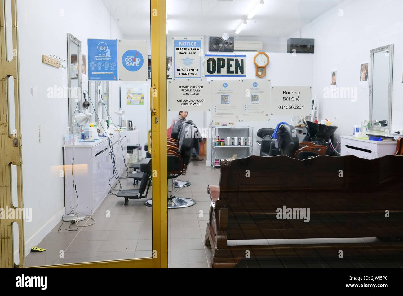 A Vietnamese hairdresser at a salon in Cabramatta — Sydney, Australia