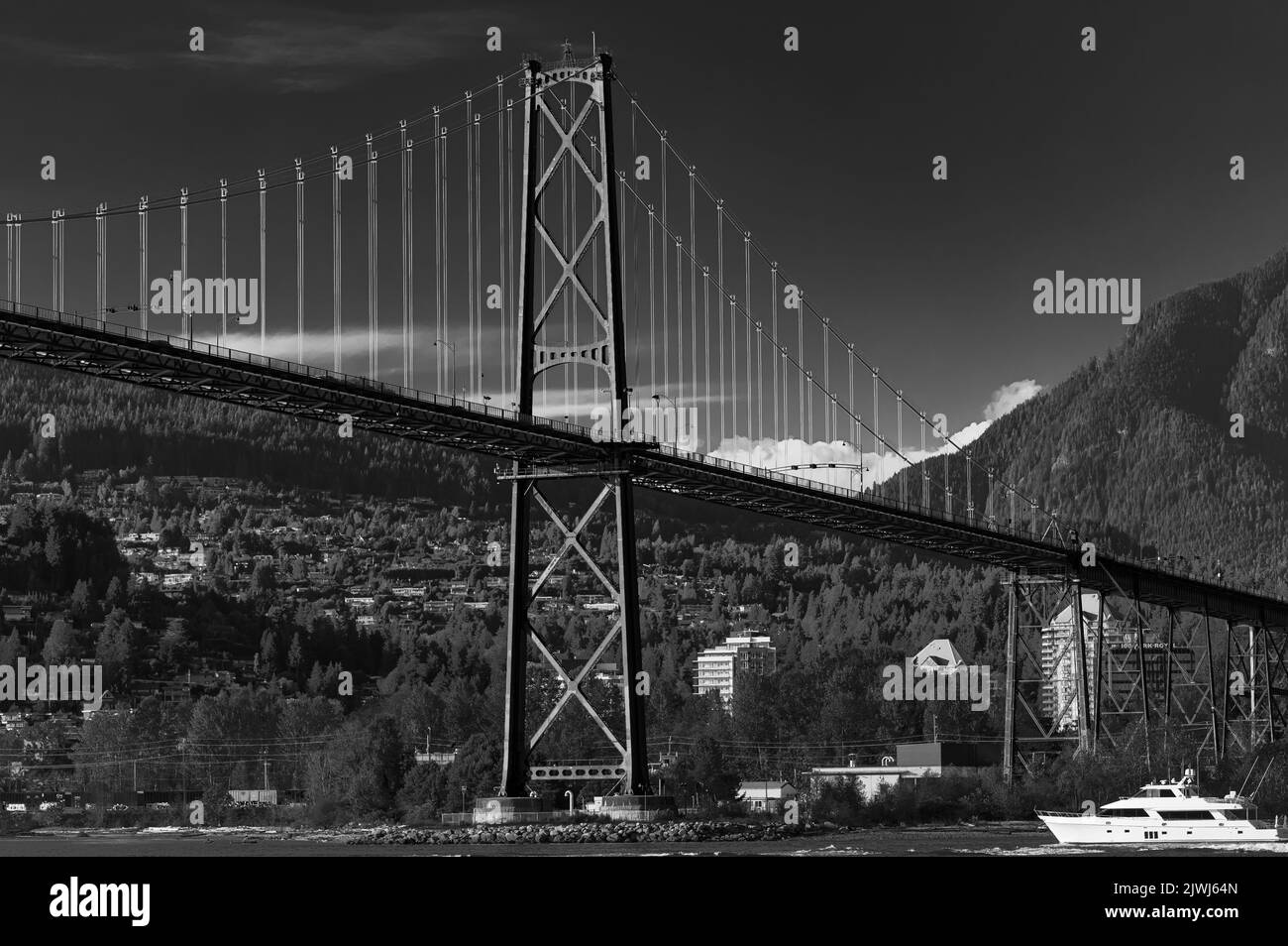 Lions Gate Bridge in summer day, Vancouver, BC, Canada. View of Lions Gate Bridge from Stanley Park. Built in the 1930s, Vancouver's Lions Gate Bridge Stock Photo