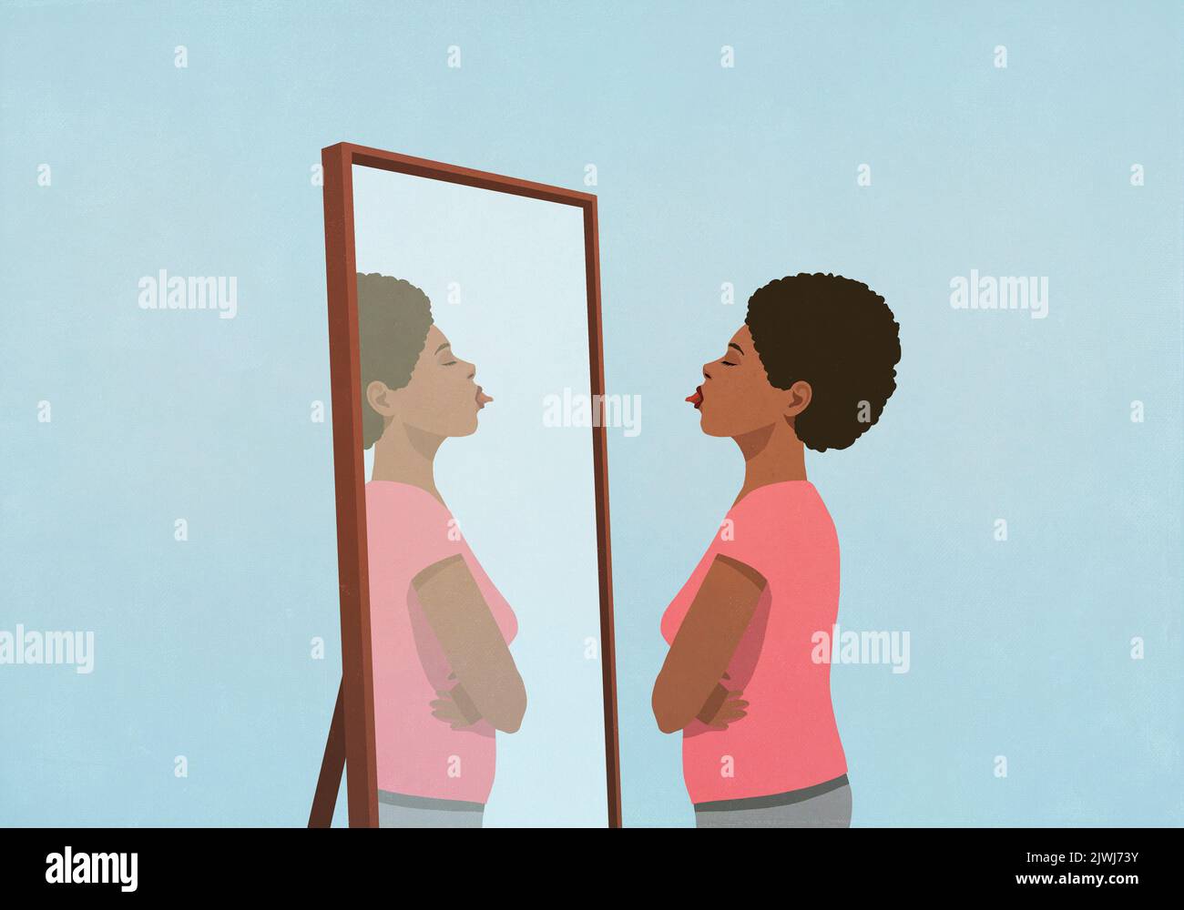 Woman sticking tongue out at mirror Stock Photo