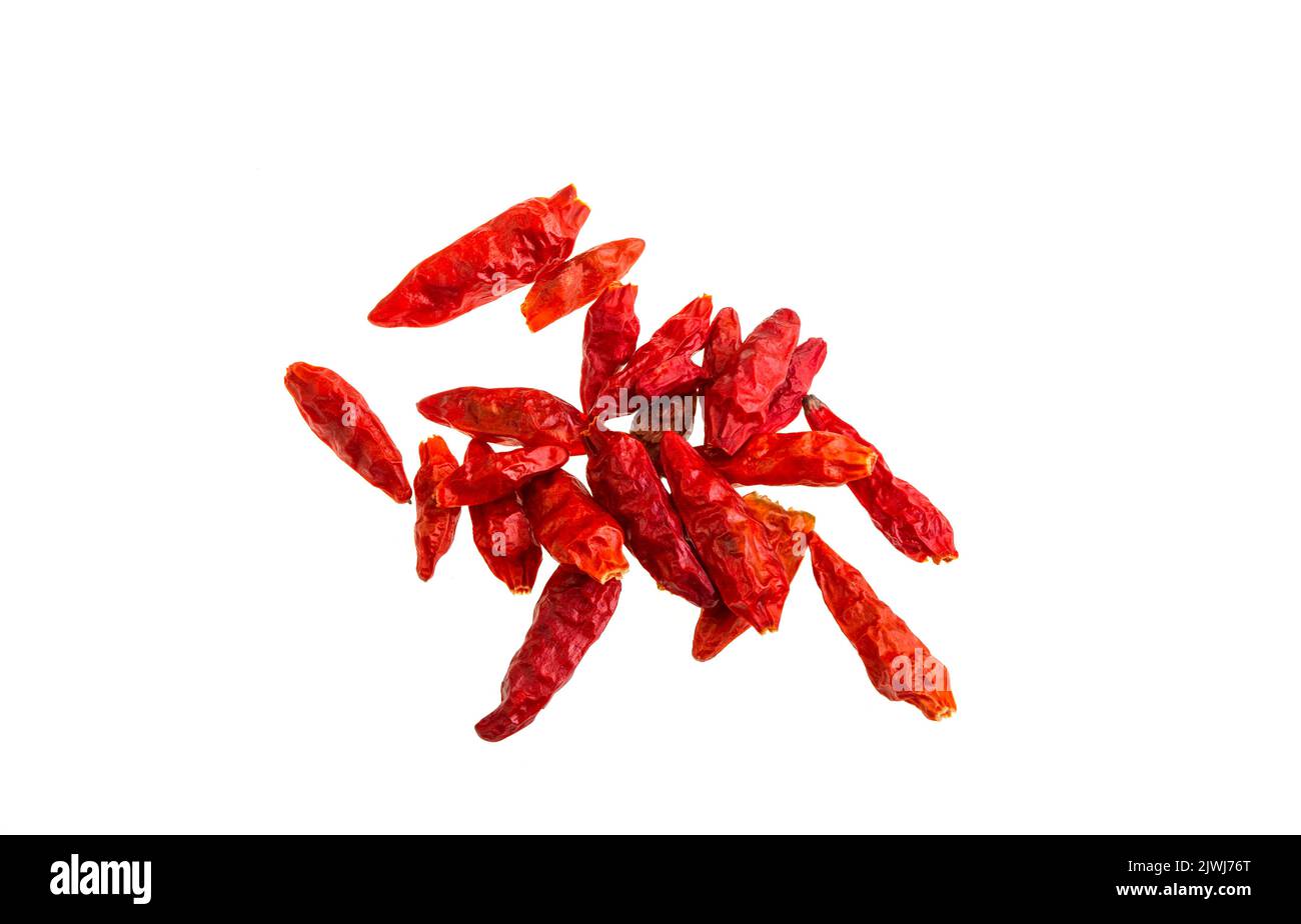 Sun dried homemade whole chilli peppers used in many cuisines as a spice to add heat to dishes Stock Photo