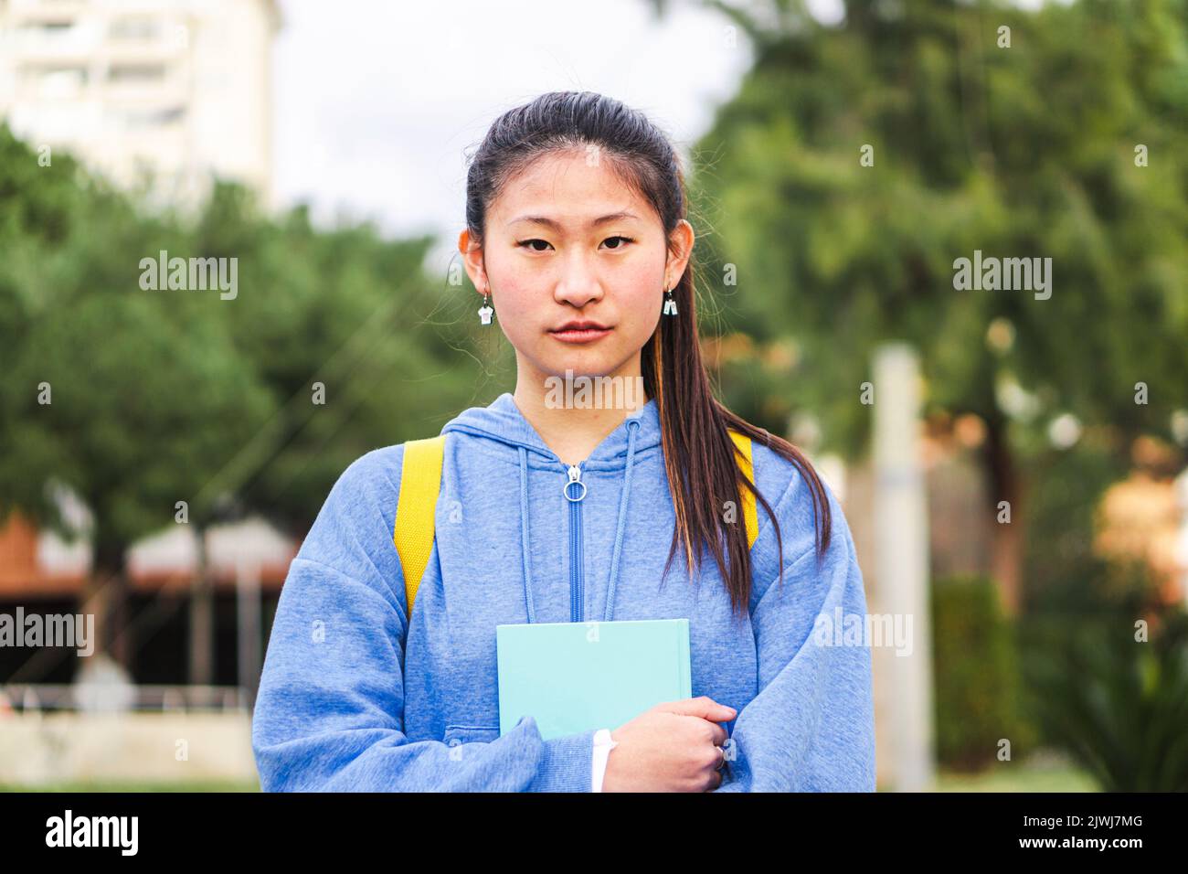 Young female chinese teen hires stock photography and images Alamy