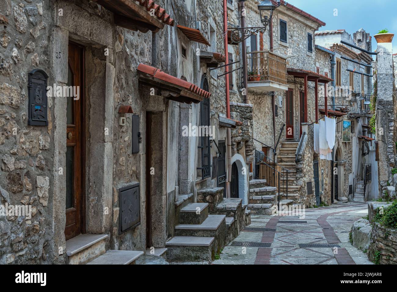 Old and ancient alleys of the medieval village of Vico del Gargano. Characteristic are the narrow steps to access the houses. Vico del Gargano, Puglia Stock Photo