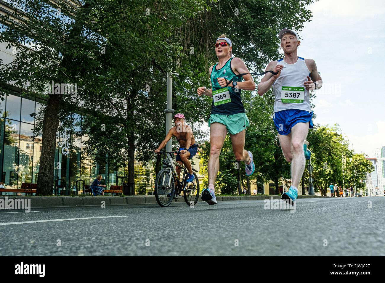 Ekaterinburg, Russia - August 7, 2022: blind athlete runner with his guide run in Europe-Asia Marathon Stock Photo