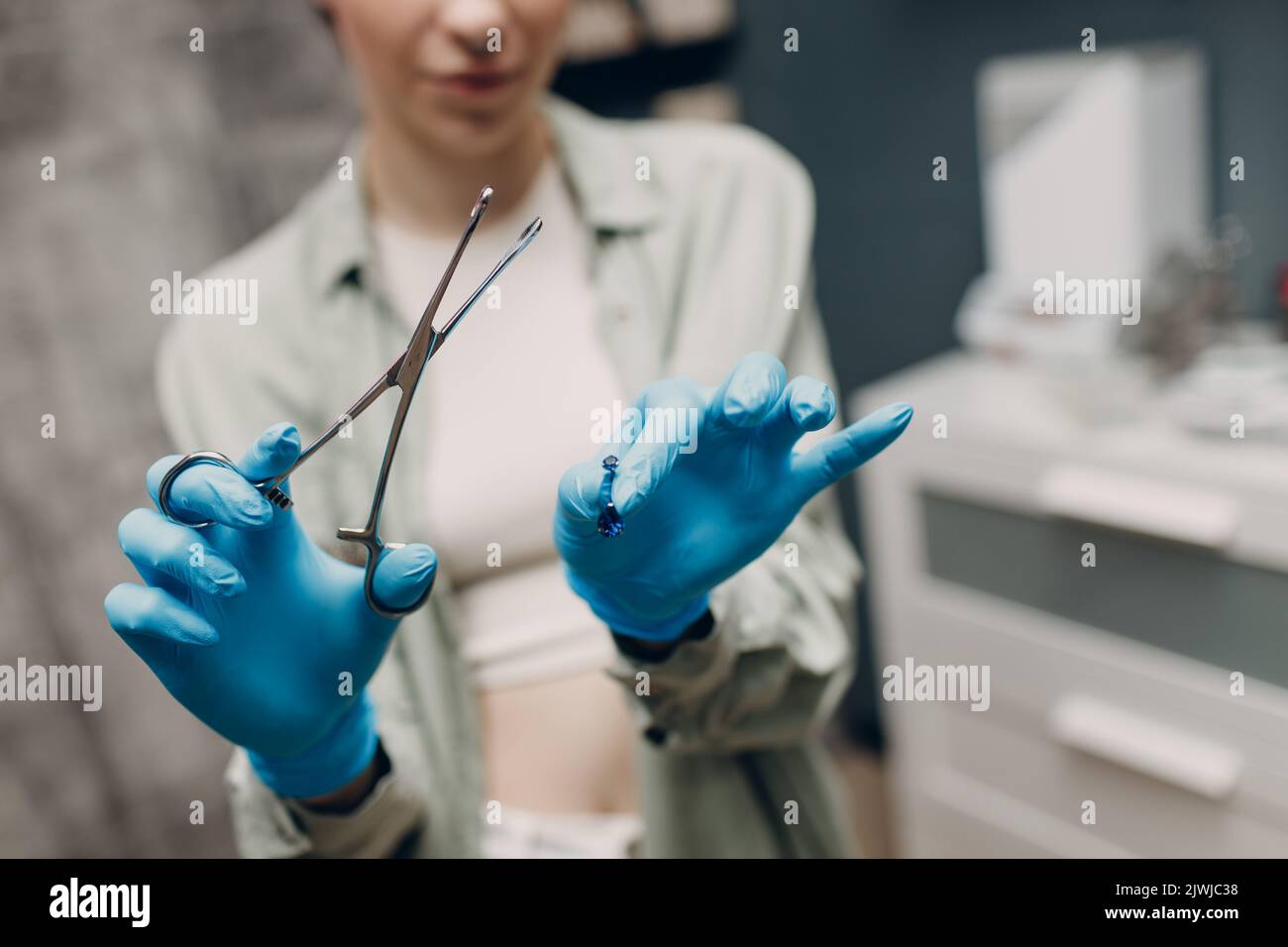 Ear piercings hires stock photography and images Alamy