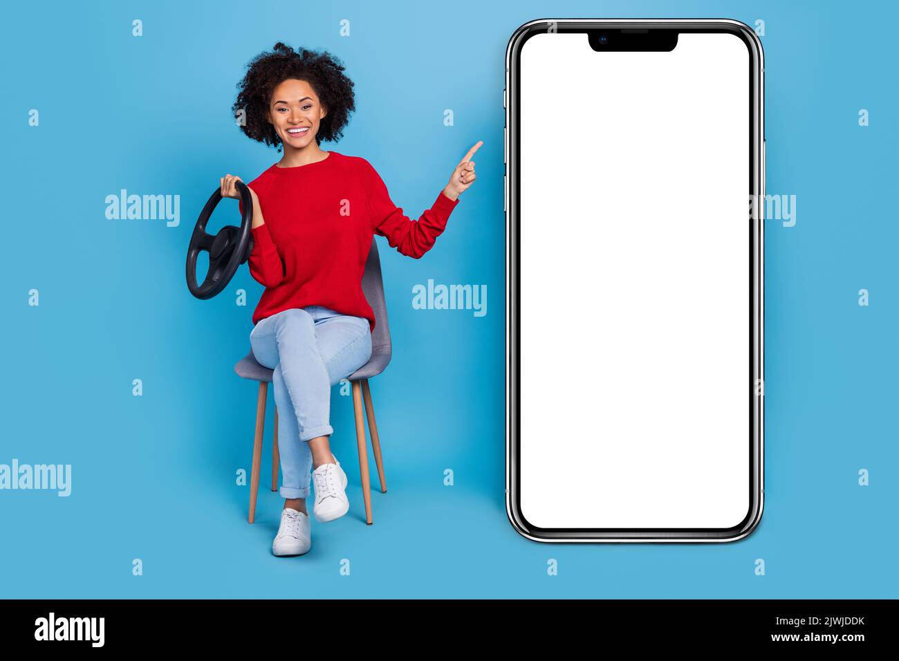 Photo of funny young lady dressed red pullover driving auto pointing