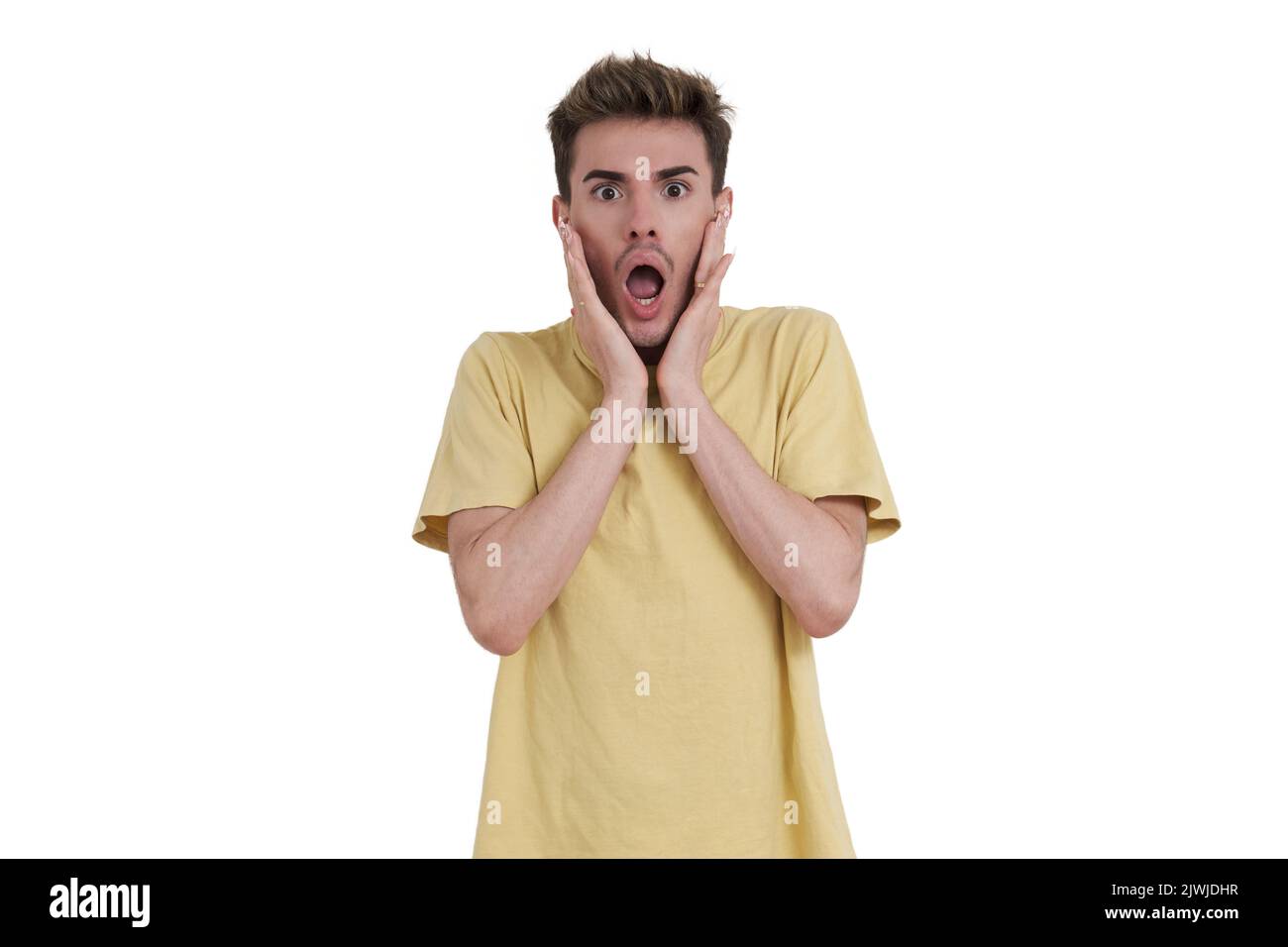 Young caucasian man surprised, isolated. Stock Photo
