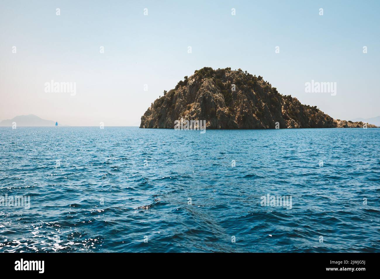 Aegean sea and rocky island landscape in Turkey nature destinations beautiful travel scenery summer season Stock Photo