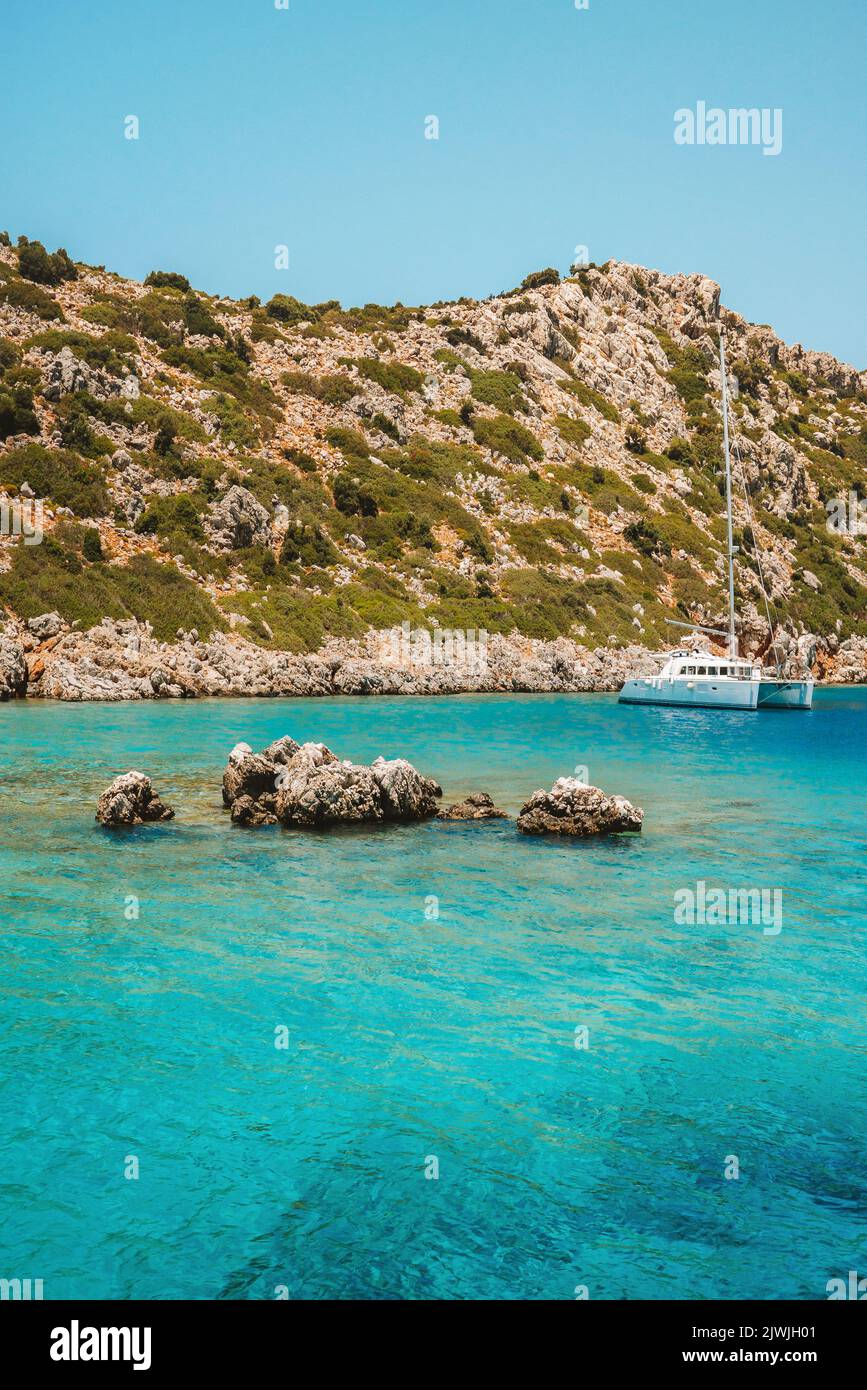 Aegean sea turquoise water reef and mountain landscape in Turkey nature destinations beautiful travel scenery summer season Stock Photo