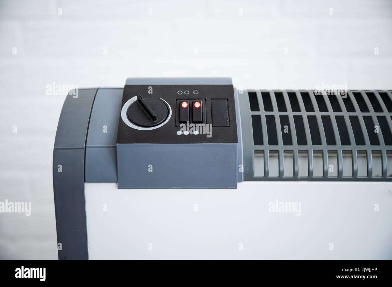 Electric convection heater heating with electric power Stock Photo