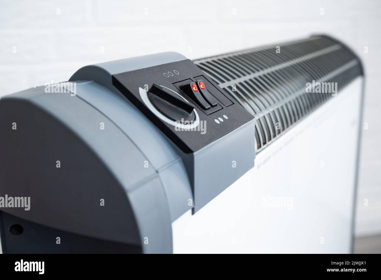 Electric convection heater heating with electric power Stock Photo