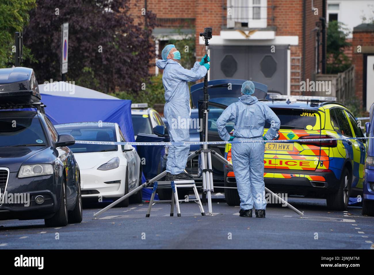 Forensics officers at the scene in Kirkstall Gardens, Streatham Hill