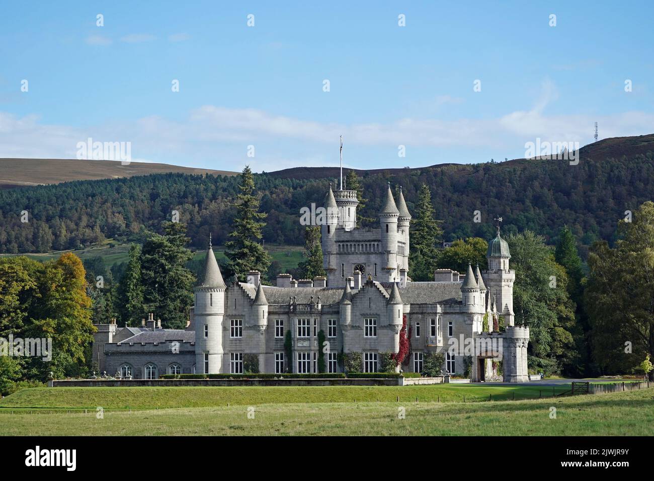 File photo dated 01/10/21 of a general view of Balmoral Castle, which is one of the residences of the Royal family, and where Queen Elizabeth II traditionally spends the summer months. The Queen is said to never be happier than when she is staying on her beloved Balmoral estate. Balmoral Castle -her private Scottish home in Aberdeenshire -was handed down to her through generations of royals after being bought for Queen Victoria by Prince Albert in 1852. Victoria described Balmoral as her 'Heaven on Earth', and it is where she sought solace after Albert's death. The turreted grey stone castle b Stock Photo