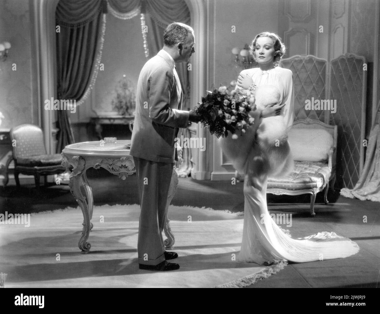JOHN HALLIDAY and MARLENE DIETRICH in DESIRE 1936 director FRANK BORZAGE costumes Travis Banton producer Ernst Lubitsch Paramount Pictures Stock Photo