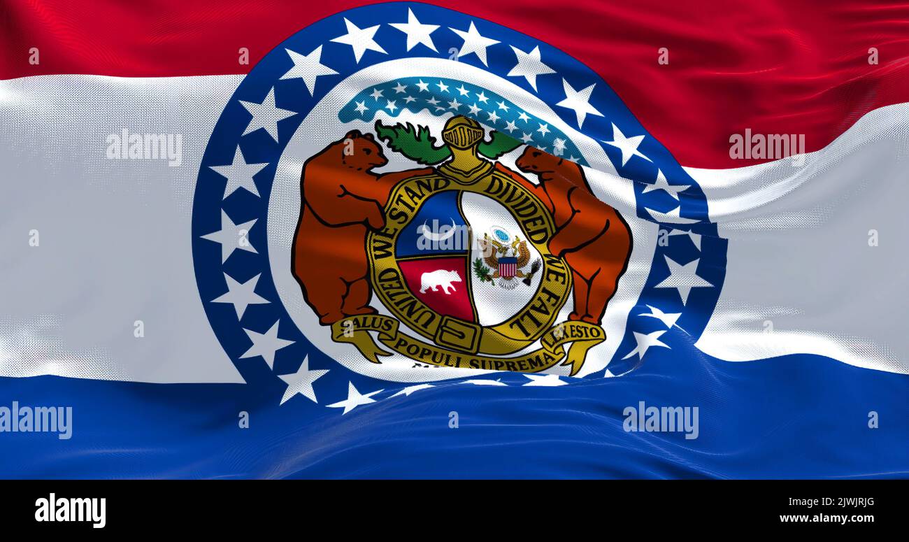The US state flag of Missouri waving in the wind. Missouri is a state in the Midwestern region of the United States. Democracy and independence. Stock Photo