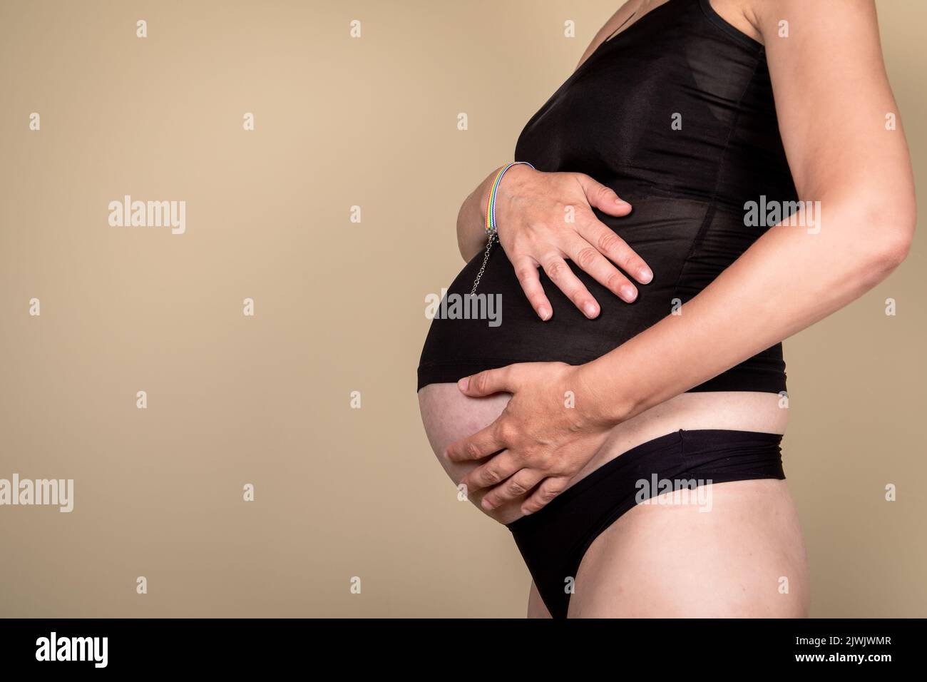 Pregnant woman, hands on stomach. Love and family concept. Stock Photo