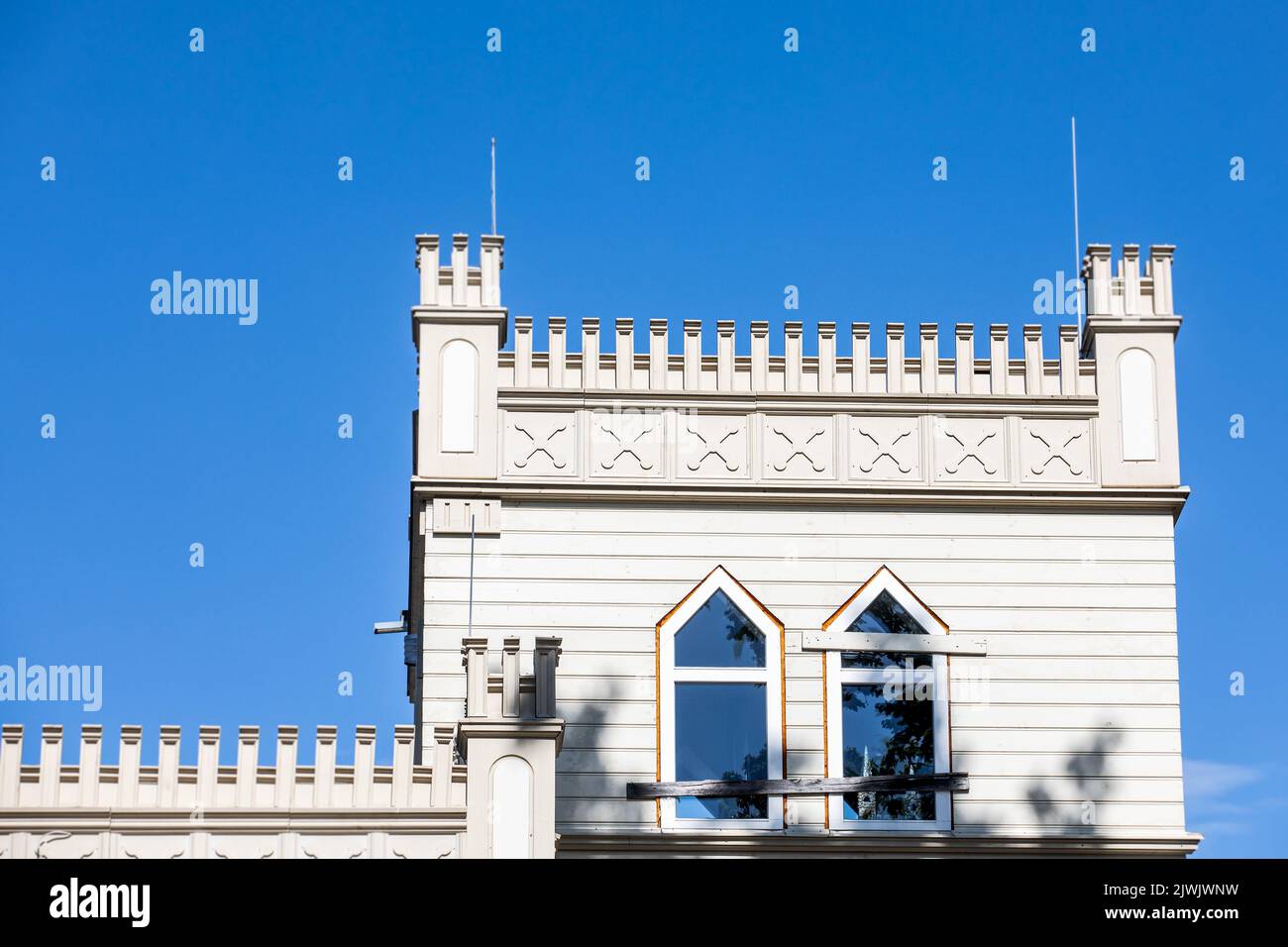 Wooden building. Abandoned castle, sunny day and blue sky. Stock Photo