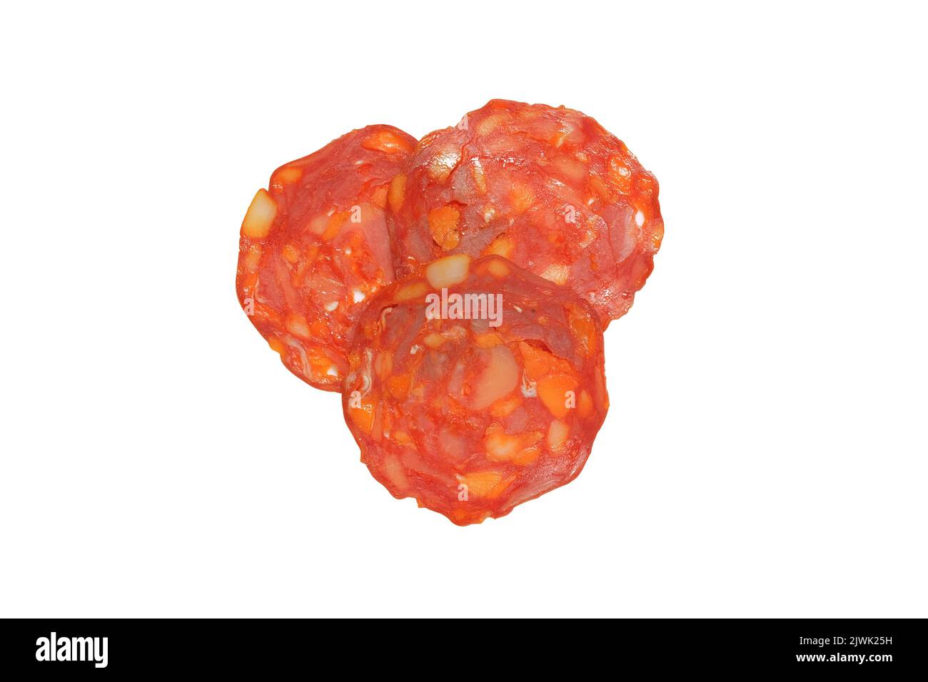Slices of chorizo sausage shot from above isolated on white background