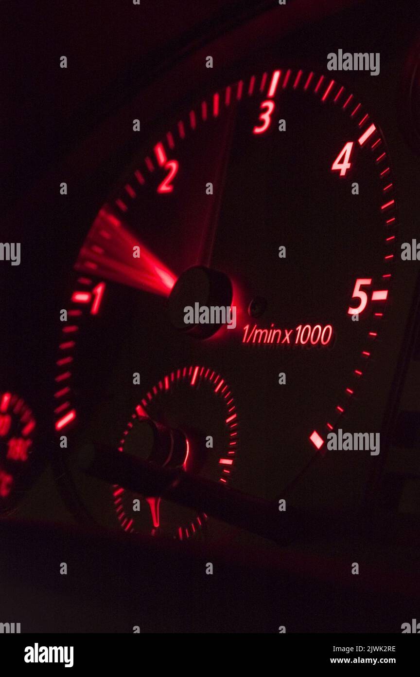 Close up of a red rev counter in a car dashboard Stock Photo Alamy