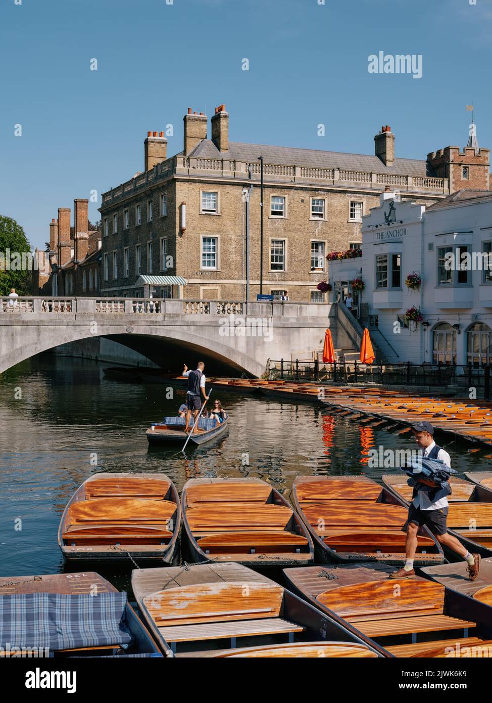 Preparing the punts at Scudamore's Boatyard Punt Station Cambridge Cambridgeshire England UK - tourism boats tour hire Stock Photo