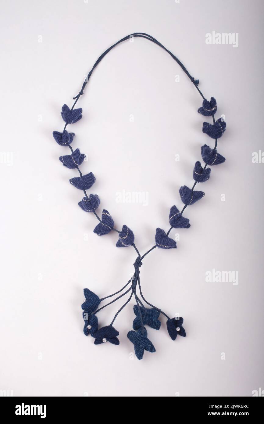 women necklace made of indigo dye cloth, beautiful craft work for women accessories Stock Photo
