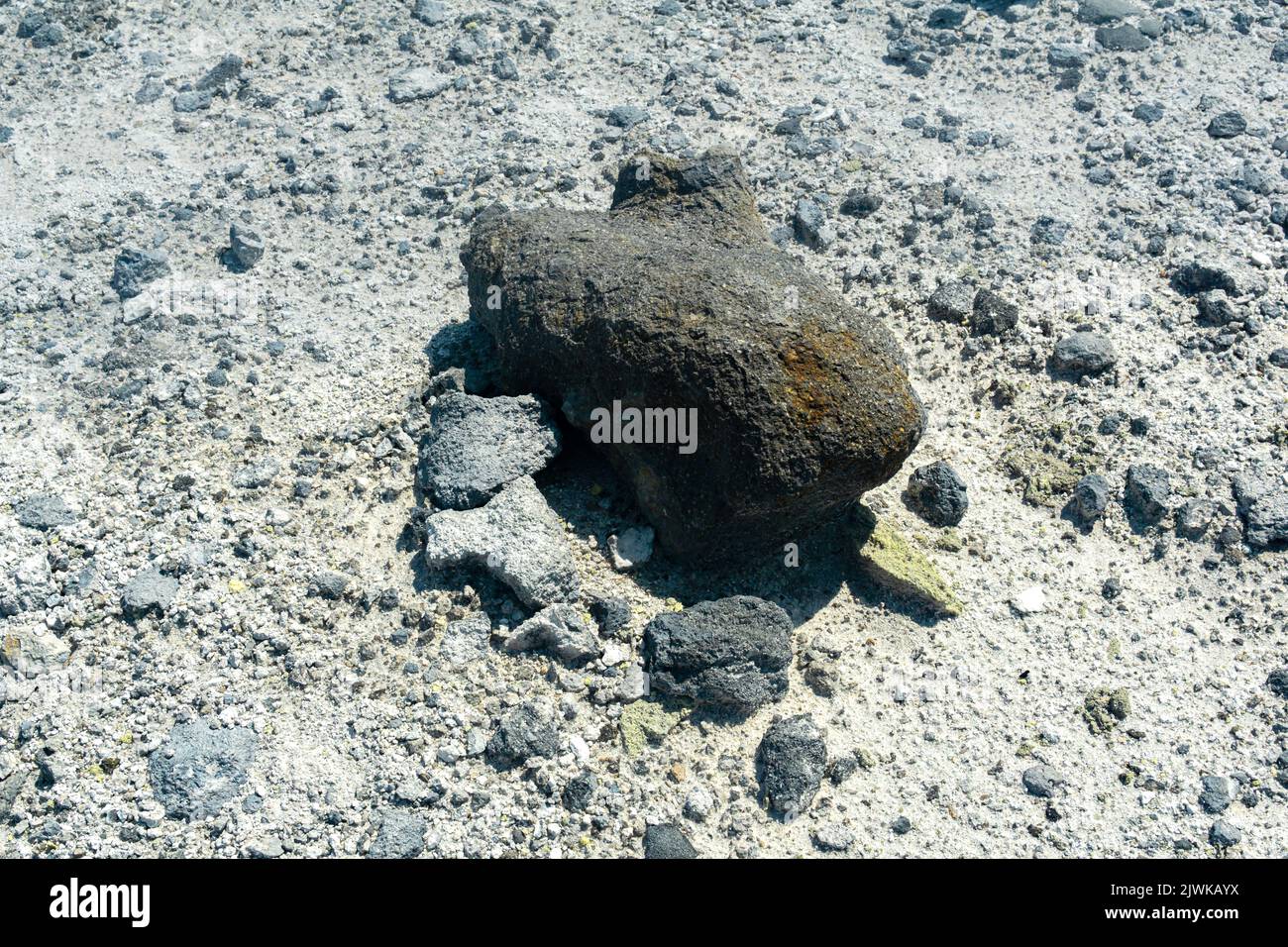 volcanic bomb among the tephra on the slope of the volcano close-up Stock Photo